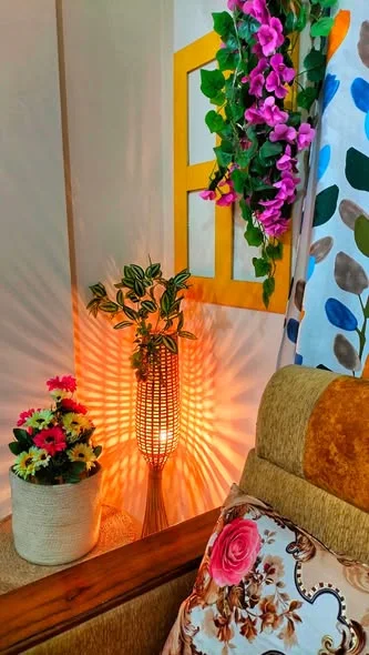Customer photo: floor lamp beside a plant